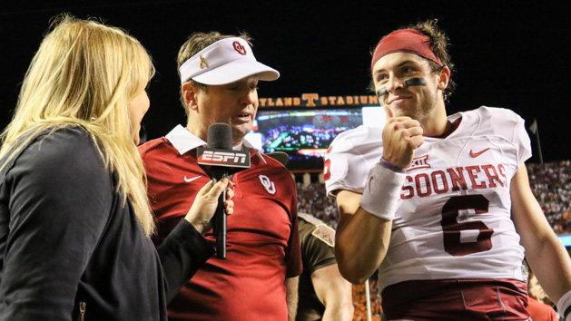 Sep 12, 2015; Knoxville, TN, USA; Oklahoma Sooners head coach Bob Stoops and quarterback Baker Mayfield (6) are interviewed by the media after defeating the Tennessee Volunteers. Oklahoma won in double overtime 31-24. Mandatory Credit: Randy Sartin-USA TODAY Sports