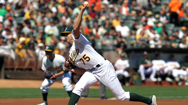 Sep 26, 2015; Oakland, CA, USA; Oakland Athletics starting pitcher Barry Zito (75) throws to the San Francisco Giants in the first inning of their MLB baseball game at O.co Coliseum. Mandatory Credit: Lance Iversen-USA TODAY Sports