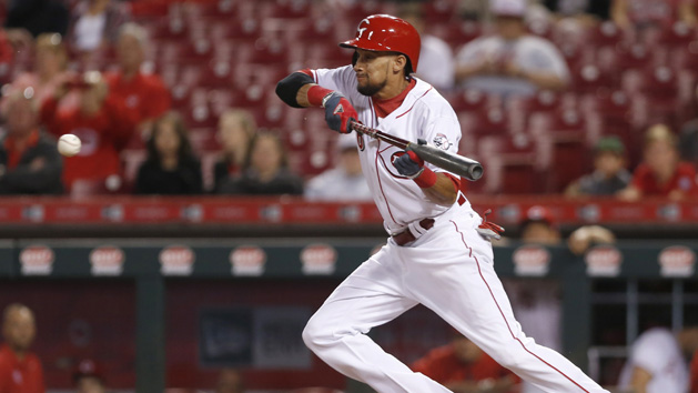 Sep 5, 2017; Cincinnati, OH, USA; Cincinnati Reds center fielder Billy Hamilton hits a sacrifice bunt against the Milwaukee Brewers during the eighth inning at Great American Ball Park. Photo Credit: David Kohl-USA TODAY Sports