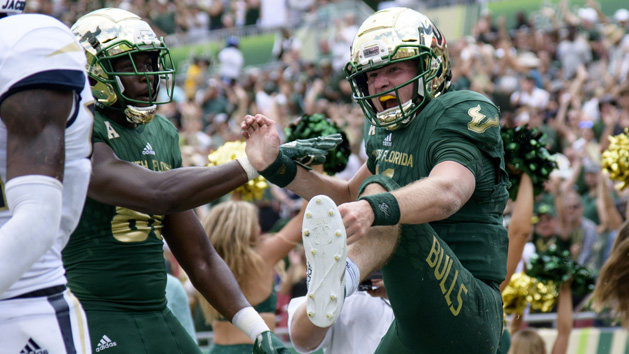 Sep 8, 2018; Tampa, FL, USA; South Florida quarterback Blake Barnett (11) celebrates his touchdown with his teammates during the second half against the Georgia Tech Yellow Jackets at Raymond James Stadium. Photo Credit: Douglas DeFelice-USA TODAY Sports