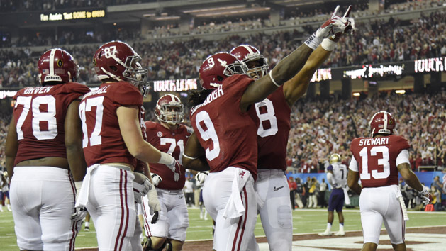 Dec 31, 2016; Atlanta, GA, USA; Alabama Crimson Tide running back Bo Scarbrough (9) ccelebrates with teammates after running the ball for a touchdown against the Washington Huskies during the fourth quarter in the 2016 CFP semifinal at the Peach Bowl at the Georgia Dome. Photo Credit: Dale Zanine-USA TODAY Sports