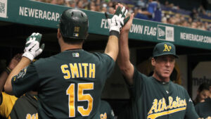 Athletics’ Melvin, Nats’ Johnson win top manager honors