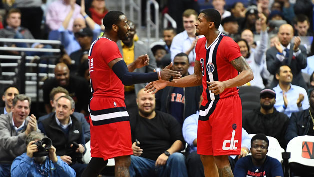 Jan 24, 2017; Washington, DC, USA; Washington Wizards guard John Wall (2) and guard Bradley Beal (3) celebrate against the Boston Celtics during the second half at Verizon Center. Washington Wizards won 123 - 108. Photo Credit: Brad Mills-USA TODAY Sports