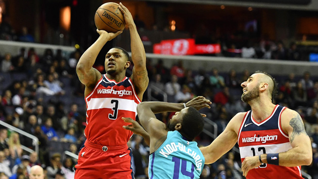Mar 31, 2018; Washington, DC, USA; Washington Wizards guard Bradley Beal (3) shoots over Charlotte Hornets forward Michael Kidd-Gilchrist (14) during the first half at Capital One Arena. Photo Credit: Brad Mills-USA TODAY Sports