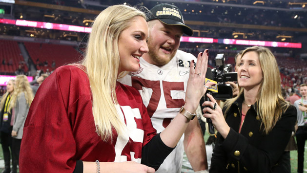Jan 8, 2018; Atlanta, GA, USA; Alabama Crimson Tide offensive lineman Bradley Bozeman (75) proposed to his girlfriend after defeating the Georgia Bulldogs to win the 2018 CFP national championship college football game at Mercedes-Benz Stadium. Photo Credit: Brett Davis-USA TODAY Sports