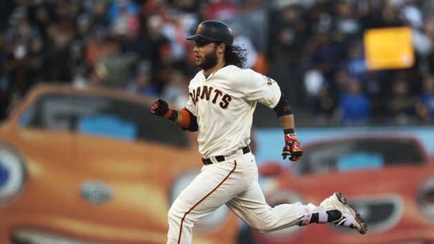 Jun 12, 2016; San Francisco, CA, USA; San Francisco Giants shortstop Brandon Crawford (35) rounds the bases after hitting a triple during the seventh inning against the Los Angeles Dodgers at AT&T Park. Mandatory Credit: Kenny Karst-USA TODAY Sports
