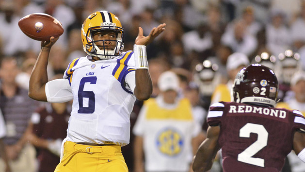 Sep 12, 2015; Starkville, MS, USA; LSU Tigers quarterback Brandon Harris (6) drops back to pass under pressure from Mississippi State Bulldogs defensive back Will Redmond (2) during the 2nd quarter at Davis Wade Stadium. Photo Credit: Matt Bush-USA TODAY Sports