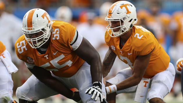 Sep 1, 2018; Charlotte, NC, USA; Tennessee Volunteers quarterback Jarrett Guarantano (2) takes the snap from Tennessee Volunteers offensive lineman Brandon Kennedy (55) during the second half at Bank of America Stadium. Photo Credit: Jim Dedmon-USA TODAY Sports