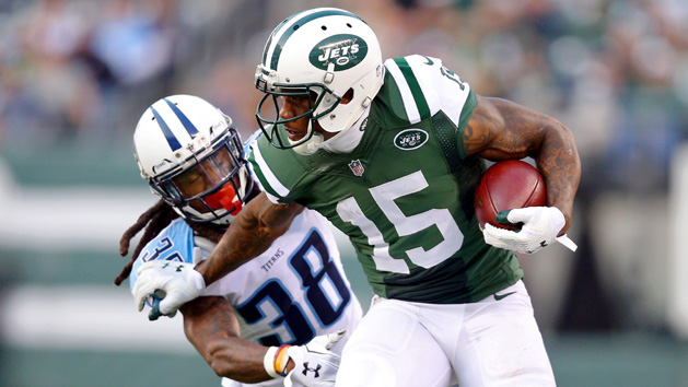 Dec 13, 2015; East Rutherford, NJ, USA; New York Jets wide receiver Brandon Marshall (15) runs past Tennessee Titans corner back B.W. Webb (38) during the fourth quarter at MetLife Stadium. The Jets defeated the Titans 30-8. Photo Credit: Brad Penner-USA TODAY Sports