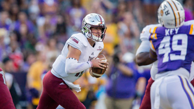 Troy Trojans quarterback Brandon Silvers (12) looks to pass the ball during the game between the LSU Tigers and the Troy Trojans at Tiger Stadium. Troy Trojans won 24-21. Photo Credit: Stephen Lew-USA TODAY Sports