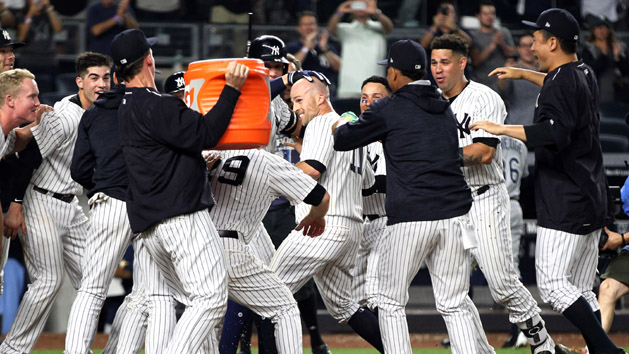 May 10, 2016; Bronx, NY, USA; New York Yankees left fielder Brett Gardner (11) hits an RBI double against the Kansas City Royals during the eighth inning at Yankee Stadium. The Yankees defeated the Royals 10-7. Mandatory Credit: Brad Penner-USA TODAY Sports