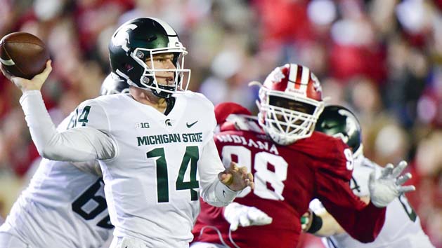 Sep 22, 2018; Bloomington, IN, USA; Michigan State Spartans quarterback Brian Lewerke (14) attempts a pass under pressure from Indiana Hoosiers defensive lineman Jerome Johnson (98) during the first half at Memorial Stadium. Photo Credit: Marc Lebryk-USA TODAY Sports