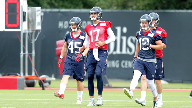 May 31, 2016; Houston, TX, USA. Houston Texans quarterback Brock Osweiler (17) stretches out during Houston Texans OTA practices at Methodist Training Center. Photo Credit: Erik Williams-USA TODAY Sports
