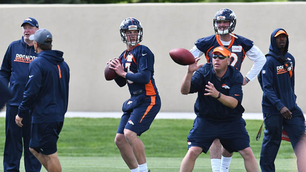 May 23, 2017; Englewood, CO, USA; Denver Broncos quarterback Trevor Siemian (13) and quarterback Paxton Lynch (12) during organized training activities at the UCHealth Training Center. Photo Credit: Ron Chenoy-USA TODAY Sports