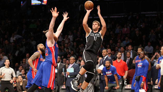 Mar 21, 2017; Brooklyn, NY, USA; Brooklyn Nets center Brook Lopez (11) shoots and makes the game winning buzzer beater over Detroit Pistons center Aron Baynes (12) during the fourth quarter at Barclays Center. Photo Credit: Brad Penner-USA TODAY Sports