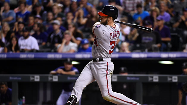 Aug 15, 2016; Denver, CO, USA; Washington Nationals right fielder Bryce Harper (34) hits an RBI double and the go ahead run in the seventh inning against the Colorado Rockies at Coors Field. The Nationals defeated the Rockies 5-4. Photo Credit: Ron Chenoy-USA TODAY Sports