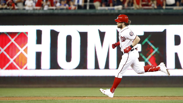 Oct 7, 2017; Washington, DC, USA; Washington Nationals right fielder Bryce Harper (34) hits a 2-RBI home run during the eighth inning in game two of the 2017 NLDS against the Chicago Cubs at Nationals Park. Photo Credit: Geoff Burke-USA TODAY Sports
