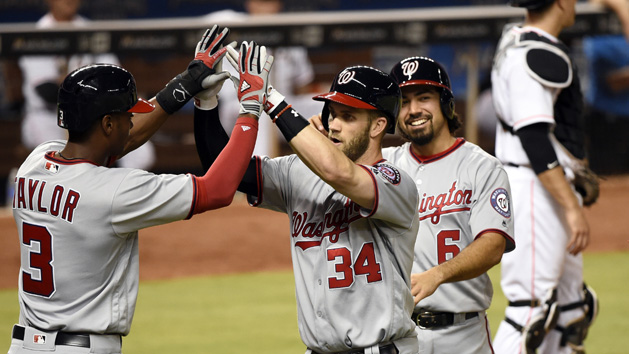 Apr 19, 2016; Miami, FL, USA; Washington Nationals right fielder Bryce Harper (center) is greeted by Nationals center fielder Michael Taylor (left) after Harper hit a grand slam during the seventh inning against the Miami Marlins at Marlins Park. Photo Credit: Steve Mitchell-USA TODAY Sports