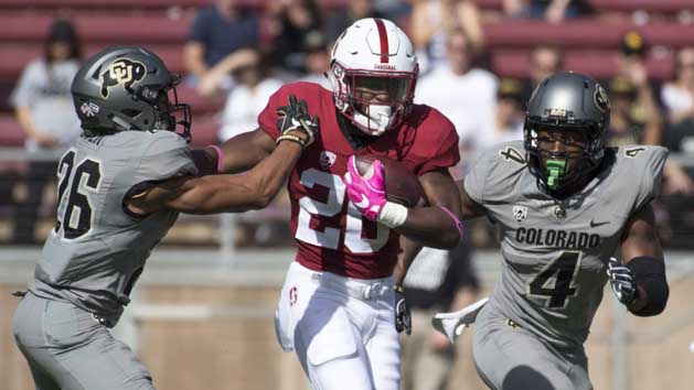 October 22, 2016; Stanford, CA, USA; Stanford Cardinal running back Bryce Love (20, center) runs against Colorado Buffaloes defensive back Isaiah Oliver (26) and defensive back Chidobe Awuzie (4) during the first quarter at Stanford Stadium. Photo Credit: Kyle Terada-USA TODAY Sports