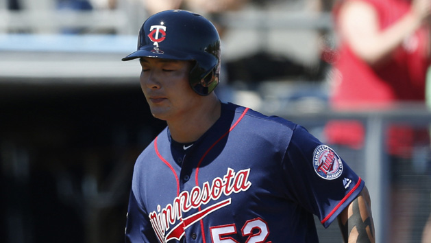 Mar 6, 2016; Port Charlotte, FL, USA; Minnesota Twins Byung Ho Park (52) runs the bases after hitting a grand slam during the first inning at Charlotte Sports Park. Mandatory Credit: Butch Dill-USA TODAY Sports