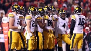Iowa goes after title, spot in playoff