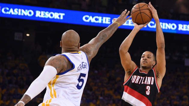 May 3, 2016; Oakland, CA, USA; Portland Trail Blazers guard C.J. McCollum (3) shoots the basketball against Golden State Warriors center Marreese Speights (5) during the second quarter in game two of the second round of the NBA Playoffs at Oracle Arena. Photo Credit: Kyle Terada-USA TODAY Sports