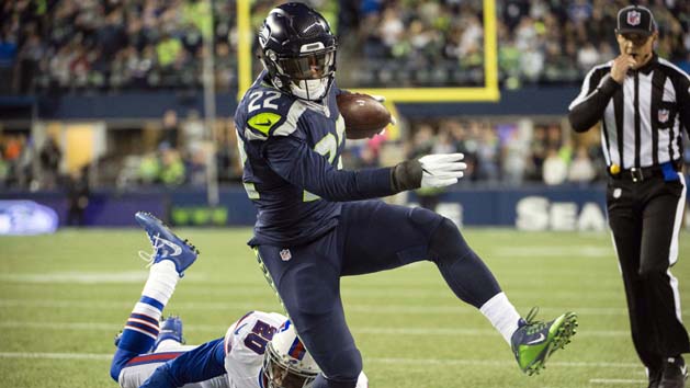 Nov 7, 2016; Seattle, WA, USA; Seattle Seahawks running back C.J. Prosise (22) picks up a first down as he is tackled by Buffalo Bills free safety Corey Graham (20) during the third quarter at CenturyLink Field. The Seahawks won 31-25. Photo Credit: Troy Wayrynen-USA TODAY Sports