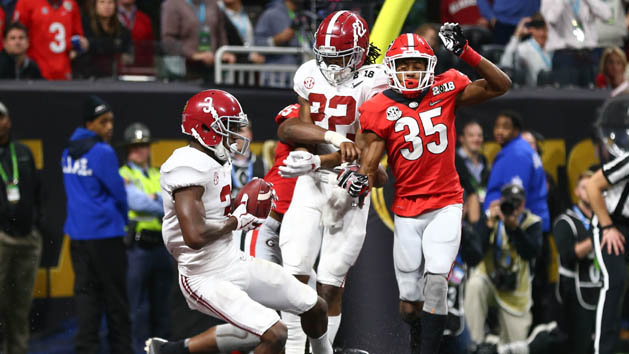 Jan 8, 2018; Atlanta, GA, USA; Alabama Crimson Tide wide receiver Calvin Ridley (3) catches a touchdown pass against Georgia Bulldogs defensive back Aaron Davis (35) during the fourth quarter in the 2018 CFP national championship college football game at Mercedes-Benz Stadium. Photo Credit: Mark J. Rebilas-USA TODAY Sports