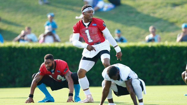 Jul 26, 2017; Spartanburg, SC, USA; Carolina Panthers quarterback Cam Newton (1) dances during stretches during training camp held at Wofford College. Photo Credit: Jeremy Brevard-USA TODAY Sports