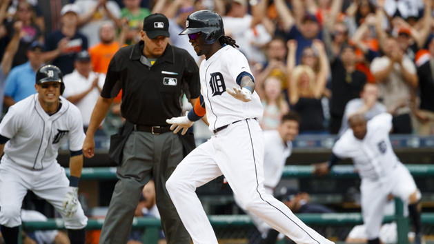 Jun 23, 2016; Detroit, MI, USA; Detroit Tigers Cameron Maybin (4) scores the winning run on a wild pitch by Seattle Mariners relief pitcher Steve Cishek (not pictured) in the 10th inning at Comerica Park. Detroit won 5-4. in ten innings. Photo Credit: Rick Osentoski-USA TODAY Sports