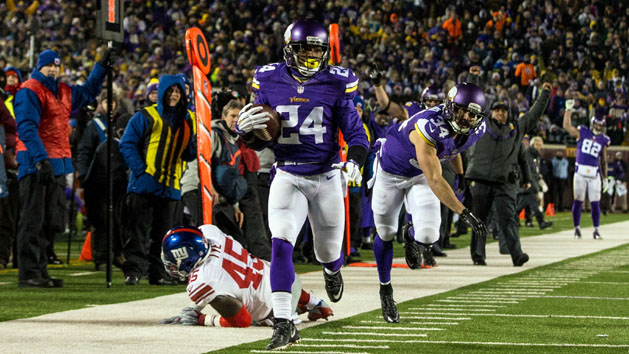 Dec 27, 2015; Minneapolis, MN, USA; Minnesota Vikings cornerback Captain Munnerlyn (24) returns an interception during the third quarter against the New York Giants at TCF Bank Stadium. The Vikings defeated the Giants 49-17. Mandatory Credit: Brace Hemmelgarn-USA TODAY Sports