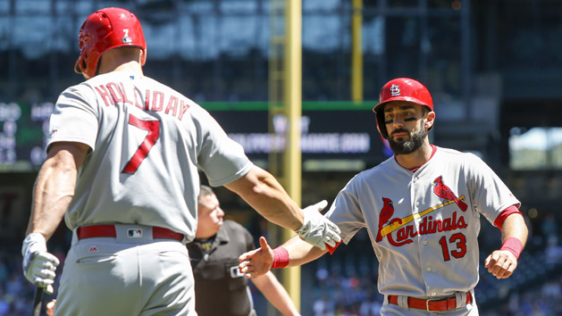 Jun 26, 2016; Seattle, WA, USA; St. Louis Cardinals designated hitter Matt Holliday (7) celebrates with second baseman Matt Carpenter (13) after Carpenter scored a run during the first inning against the Seattle Mariners at Safeco Field. Photo Credit: Jennifer Buchanan-USA TODAY Sports