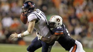 Auburn tops Ole Miss, last year’s win total