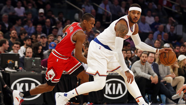 Apr 4, 2017; New York, NY, USA; New York Knicks forward Carmelo Anthony (7) looks to pass in front of Chicago Bulls guard Rajon Rondo (9) during the first quarter at Madison Square Garden. Photo Credit: Adam Hunger-USA TODAY Sports