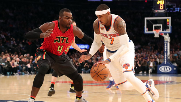 Nov 20, 2016; New York, NY, USA; New York Knicks forward Carmelo Anthony (7) drives past Atlanta Hawks forward Paul Millsap (4) during the first quarter at Madison Square Garden. Photo Credit: Anthony Gruppuso-USA TODAY Sports