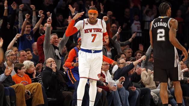 Feb 12, 2017; New York, NY, USA; New York Knicks forward Carmelo Anthony (7) reacts after hitting a three-point basket during the second half against the San Antonio Spurs at Madison Square Garden. Photo Credit: Adam Hunger-USA TODAY Sports