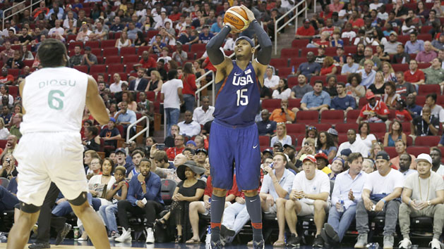 Aug 1, 2016; Houston, TX, USA; United States forward Carmelo Anthony (15) shoots against Nigeria forward Ike Diogu (6) in the second quarter during an exhibition basketball game at Toyota Center. United States won 110 to 66. Photo Credit: Thomas B. Shea-USA TODAY Sports