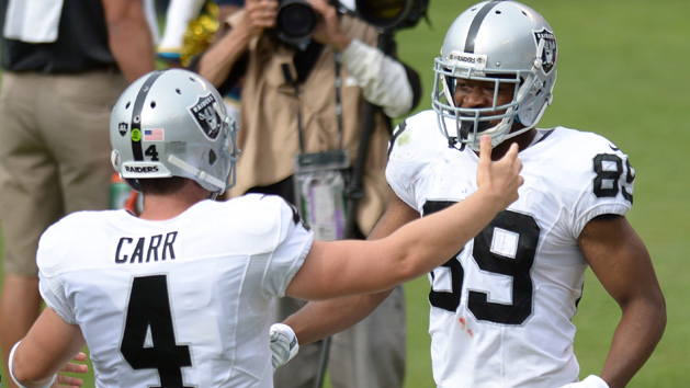 Oct 25, 2015; San Diego, CA, USA; Oakland Raiders wide receiver Amari Cooper (89) celebrates a touchdown with quarterback Derek Carr (4) during the second quarter against the San Diego Chargers at Qualcomm Stadium. Photo Credit: Jake Roth-USA TODAY Sports