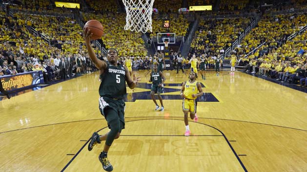 Feb 24, 2019; Ann Arbor, MI, USA; Michigan State Spartans guard Cassius Winston (5) goes to the basket in the first half against the Michigan Wolverines at Crisler Center. Photo Credit: Rick Osentoski-USA TODAY Sports