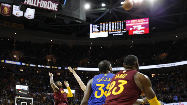 Dec 25, 2016; Cleveland, OH, USA; Cleveland Cavaliers guard Kyrie Irving (2) makes the winning shot against Golden State Warriors guard Klay Thompson (11) at Quicken Loans Arena. Cleveland defeats Golden State 109-108. Photo Credit: Brian Spurlock-USA TODAY Sports