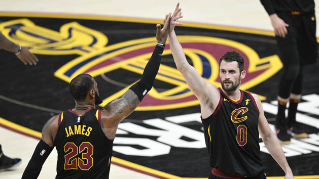 Dec 21, 2017; Cleveland, OH, USA; Cleveland Cavaliers forward LeBron James (23) and forward Kevin Love (0) celebrate in the fourth quarter against the Chicago Bulls at Quicken Loans Arena. Photo Credit: David Richard-USA TODAY Sports