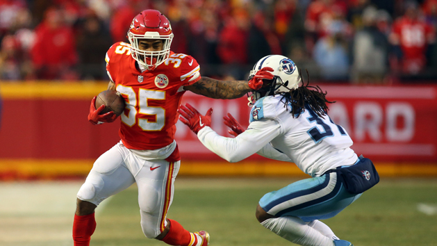 Jan 6, 2018; Kansas City, MO, USA; Kansas City Chiefs running back Charcandrick West (35) runs against Tennessee Titans safety Johnathan Cyprien (37) in the first half in the AFC Wild Card playoff football game at Arrowhead Stadium. Photo Credit: Jay Biggerstaff-USA TODAY Sports