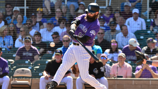Mar 5, 2019; Salt River Pima-Maricopa, AZ, USA; Colorado Rockies center fielder Charlie Blackmon (19) flies out in the first inning against the Milwaukee Brewers at Salt River Fields at Talking Stick. Photo Credit: Matt Kartozian-USA TODAY Sports