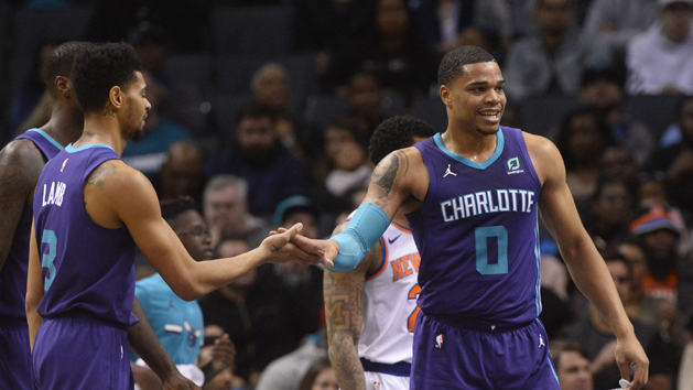 Jan 28, 2019; Charlotte, NC, USA; Charlotte Hornets forward Miles Bridges (0) reacts with guard forward Jeremy Lamb (3) during the second half against the New York Knicks at the Spectrum Center. The Hornets won 101-92. Photo Credit: Sam Sharpe-USA TODAY Sports