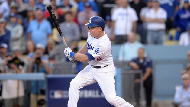 Oct 11, 2016; Los Angeles, CA, USA; Los Angeles Dodgers second baseman Chase Utley (26) drives in a run with a single in the eighth inning against the Washington Nationals during game four of the 2016 NLDS playoff baseball series at Dodger Stadium. Photo Credit: Gary A. Vasquez-USA TODAY Sports