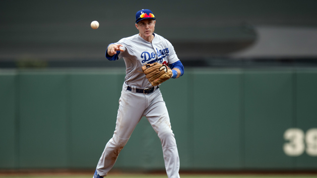 Apr 10, 2016; San Francisco, CA, USA; Los Angeles Dodgers second baseman Chase Utley (26) fields a ground ball and records the out at first base during the fourth inning against the San Francisco Giants at AT&T Park. Photo Credit: Kenny Karst-USA TODAY Sports