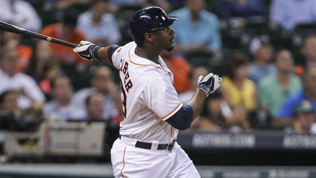 Aug 12, 2014; Houston, TX, USA; Houston Astros designated hitter Chris Carter (23) hits a home run during the fifth inning against the Minnesota Twins at Minute Maid Park. Photo Credit: Troy Taormina-USA TODAY Sports