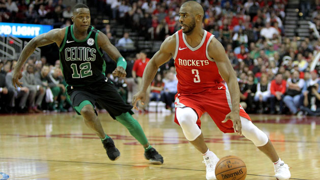 Mar 3, 2018; Houston, TX, USA; Houston Rockets guard Chris Paul (3) handles the ball while Boston Celtics guard Terry Rozier (12) defends during the fourth quarter at Toyota Center. Photo Credit: Erik Williams-USA TODAY Sports