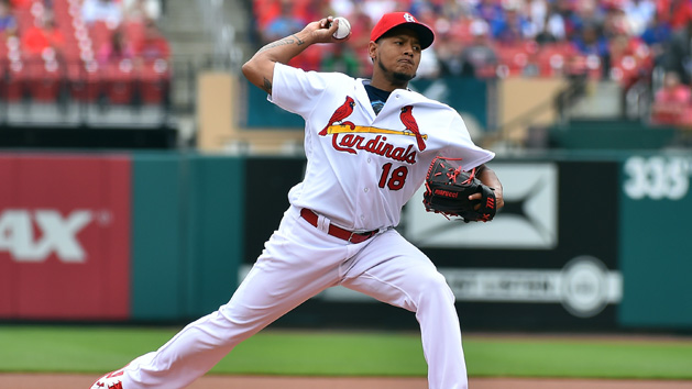 Apr 20, 2016; St. Louis, MO, USA; St. Louis Cardinals starting pitcher Carlos Martinez (18) pitches in the first inning against the Chicago Cubs at Busch Stadium. Mandatory Credit: Jasen Vinlove-USA TODAY Sports