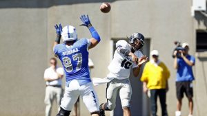 Aggies make statement in conference debut